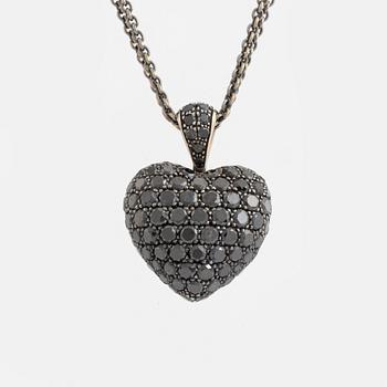 A TOWE jewels 18K white gold heart pendant set with black diamonds.