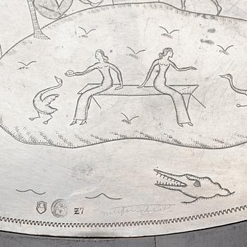A Nils Fougstedt engraved pewter top table, Svenskt Tenn, Stockholm 1926.