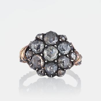 A ring set with rose-cut diamonds.