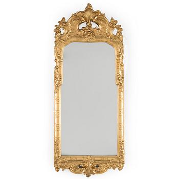 A Rococo mirror, 18th century.