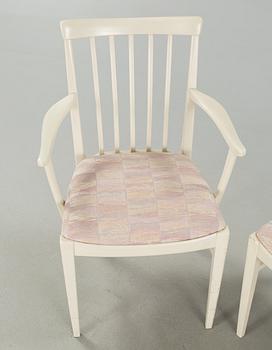 A dining table and six chairs, chairs by Carl Malmsten, model "Herrgården", second half of the 20th century.