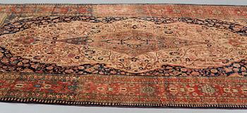 A CARPET, an antique/semi-antique Kashan so called Motachem, ca 333,5-354 x 218-243 cm.
