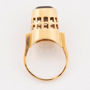 An 18K gold and smoke quartz Sigurd Persson ring.
