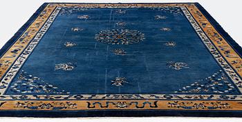 An antique Peking (Beijing) carpet, North China, c  435 x 311 cm.