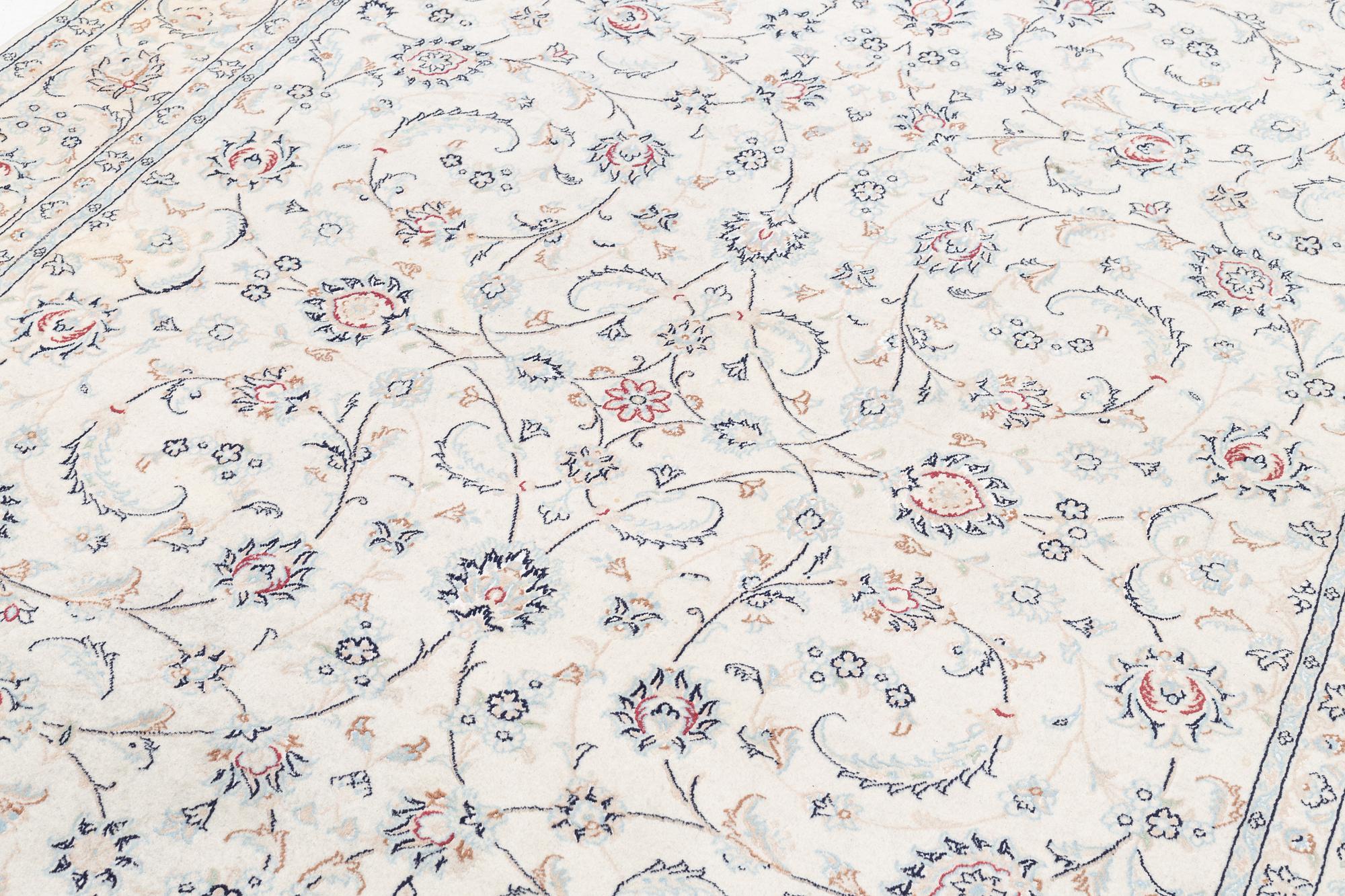 Rug, Nain, part silk, latter part of the 20th century, 293 x 198 cm.