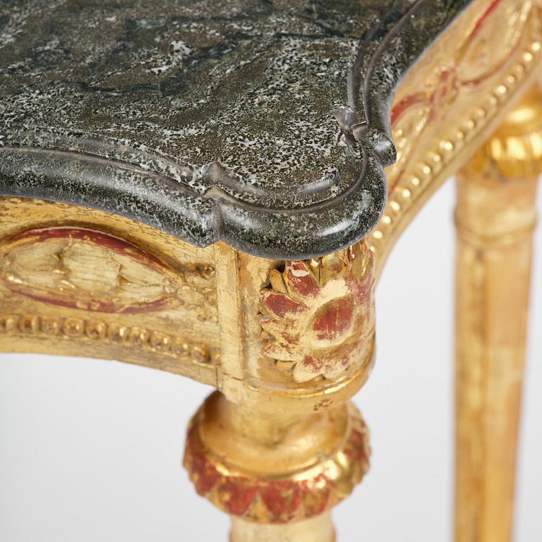A Gustavian giltwood and Kolmårdsmarble-top console table, Stockholm, late 18th century.