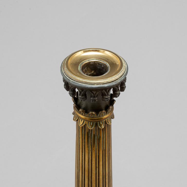 A mid 19th century late empire candlestick.