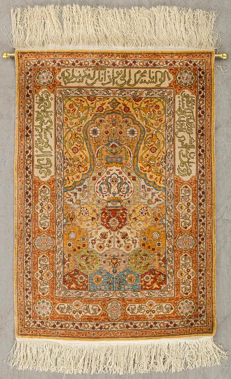 An old/semiantique Hereke silk carpet ca 77 x 53 cm.