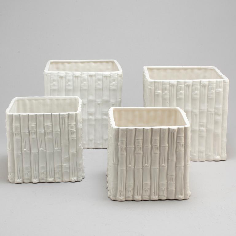 a set of four ceramic flower pots from Italy in the second half of the 20th century.