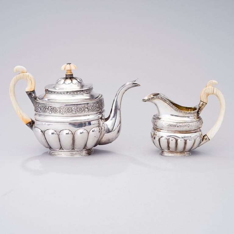 A SILVER COFFE POT AND CREAMER, Moscow 1828 and St:Petersburg 1836, total weight 750 g.