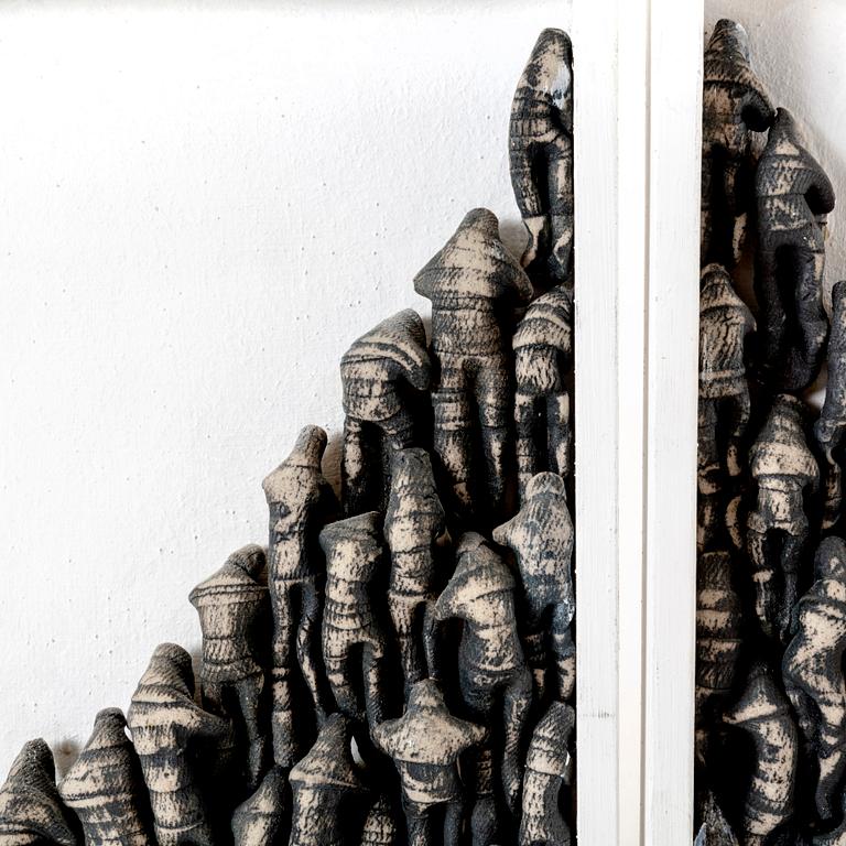 Ulla Viotti, a set of stoneware and wood wall reliefs.