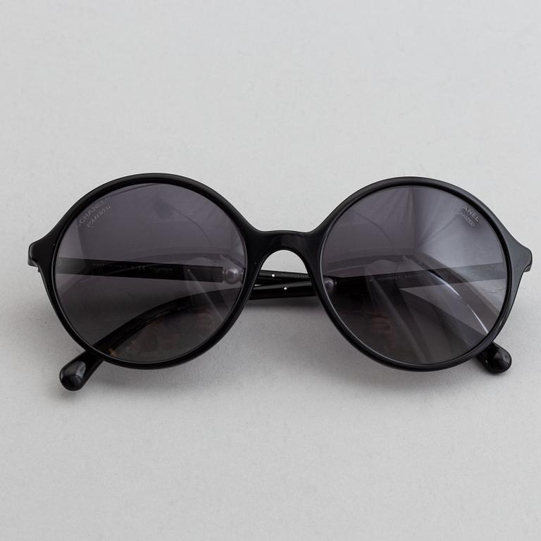 Chanel, a pair of sunglasses.