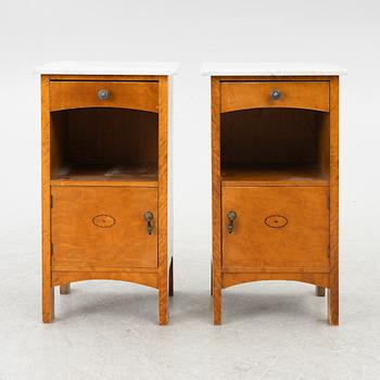 A pair of early 20th century bedside tables.