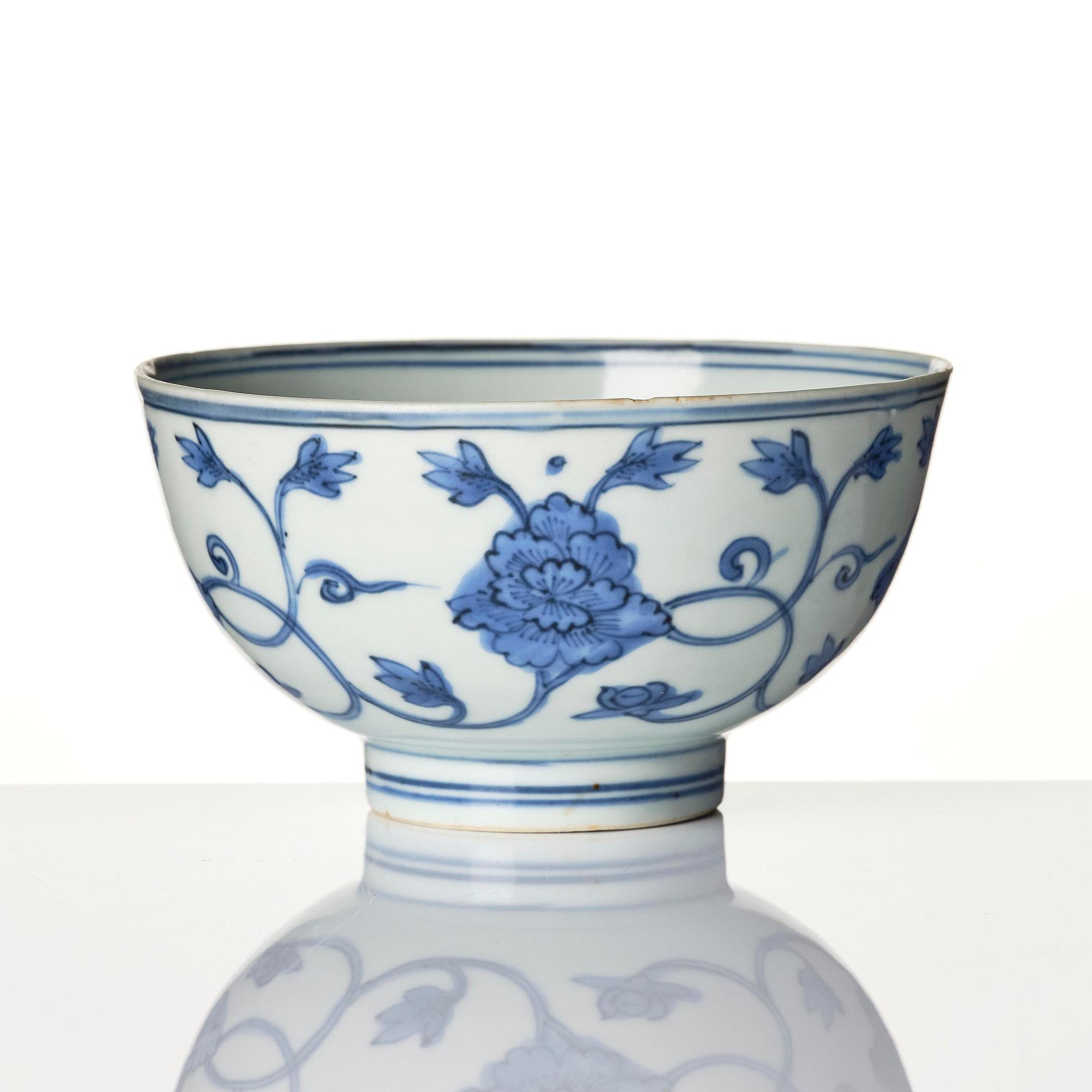 A blue and white 'floral' bowl and a dish, Ming dynasty, Jiajing (1522-1566).