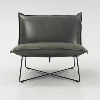 A contemporary lounge chair by Jess Design.