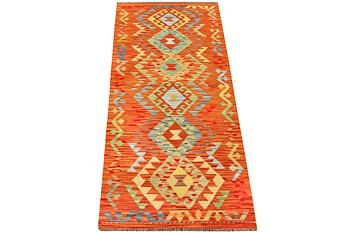 An afgahn Kilim runner, a. 248 x 82 cm.