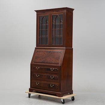 Skrivskåp med vitrinöverdel,  1900-talets andra hälft.