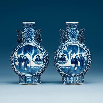 1765. A pair of blue and white bottles, late Qing dynasty.