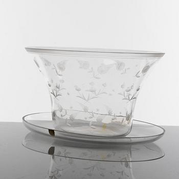 Edward Hald, an angraved glass bowl and plate, Orrefors, Sweden, model H932 and H348.