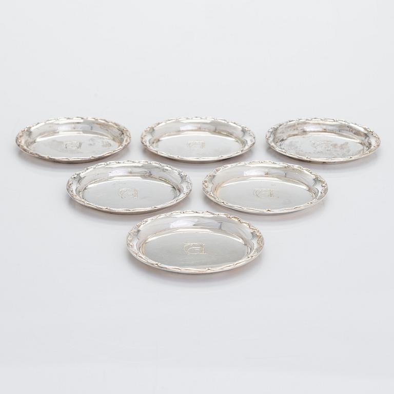 A silver sugar bowl, cream jug and footed serving bowl, and six coasters, Turku and Hämeenlinna 1934-56.