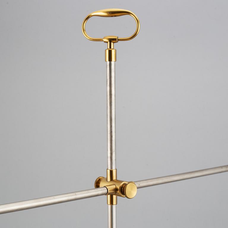 Le Klint, a brass adjustable T210 table light, Denmark.