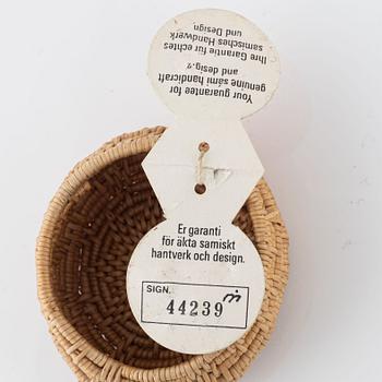 Three small root baskets, two signed.