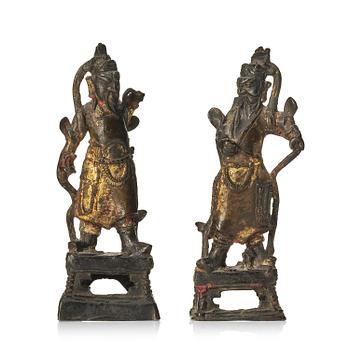 906. Two gilt bronze figures of guardsmen, Ming dynasty (1368-1644).