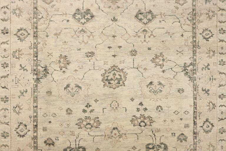 An oriental carpet with Mamluk-design, c. 360 x 280 cm.
