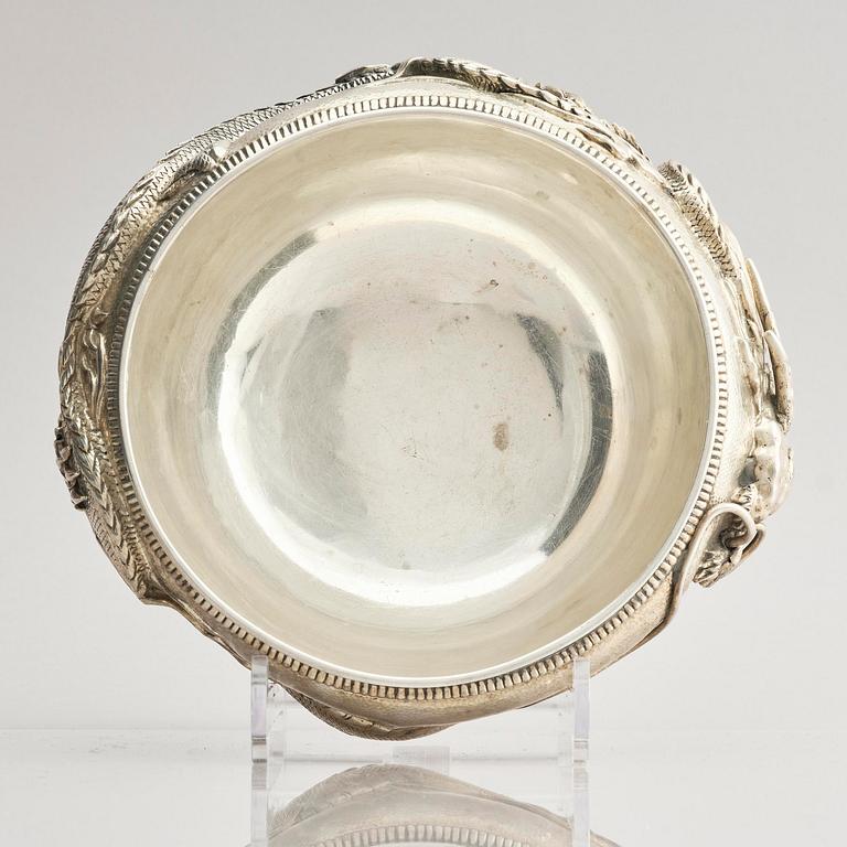 A Chinese double walled 'dragon' silver bowl, Shanghai, around 1900.