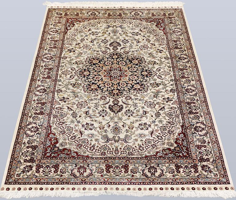 An Oriental silk rug, approx. 153 x 94 cm.