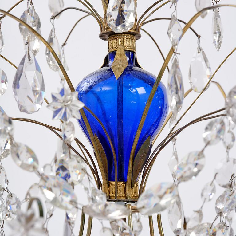 A Russian / Northern European Louis XVI-style gilt brass and blue glass six-branch chandelier, 19th century.