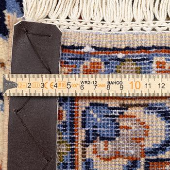 A Najafabad carpet, c. 335 x 255 cm.