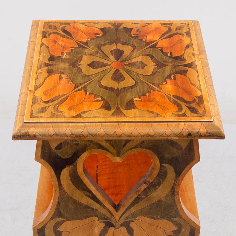 An early 20th century art nouveau shelf.