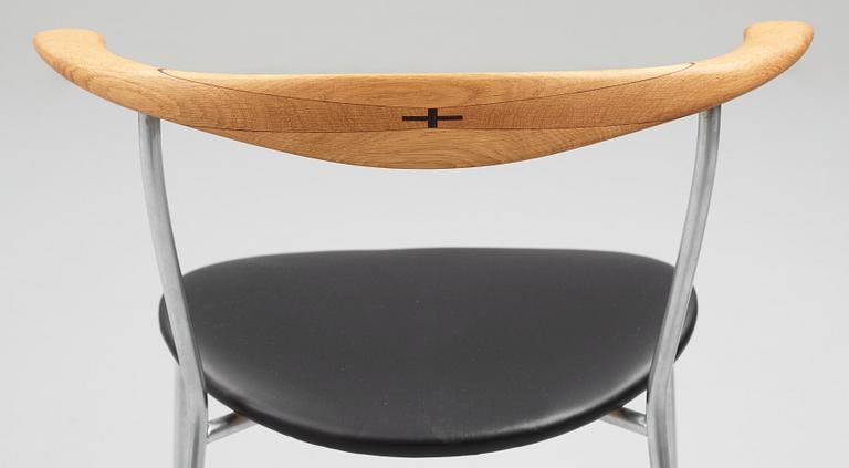 Hans J. Wegner, a set of six "JH-701" oak and black leather chairs by Johannes Hansen, Denmark.