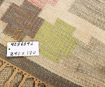 Ingegerd Silow, a flat weave carpet, signed IS, c. 240 x 170 cm.