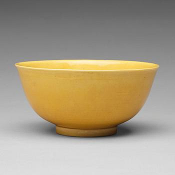 A yellow glazed bowl, Qing dynasty with Daoguang mark.