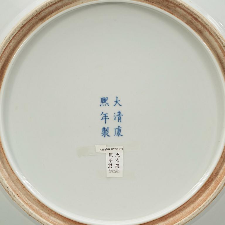 A large famille verte charger, Qing dynasty, 19th century, with Kangxis six character mark.