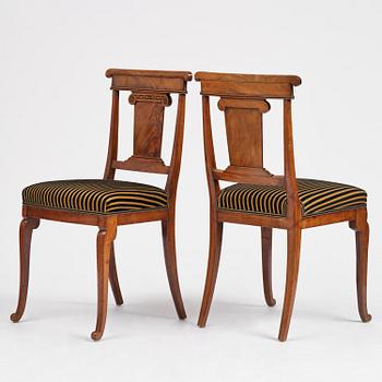 A set of nine Charles X mahogny dining chairs.