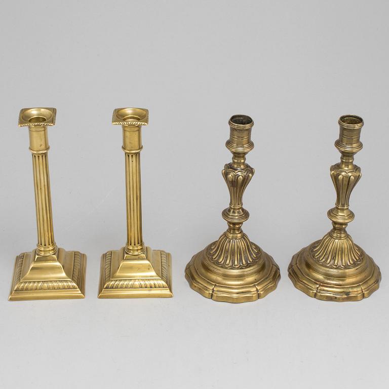 CANDLESTICKS, two pairs, brass, 18th and 19th century.