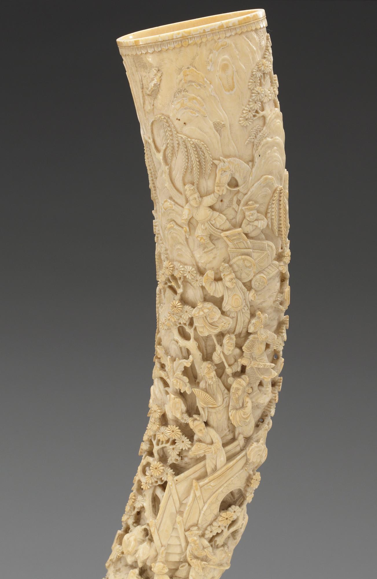 A finely carved ivory tusk, Qing dynasty, 19th Century.
