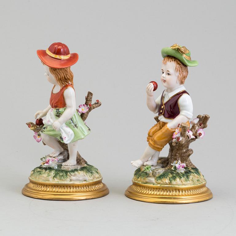 a pair of porcelain figurines marked similar to meissen, 20th century.