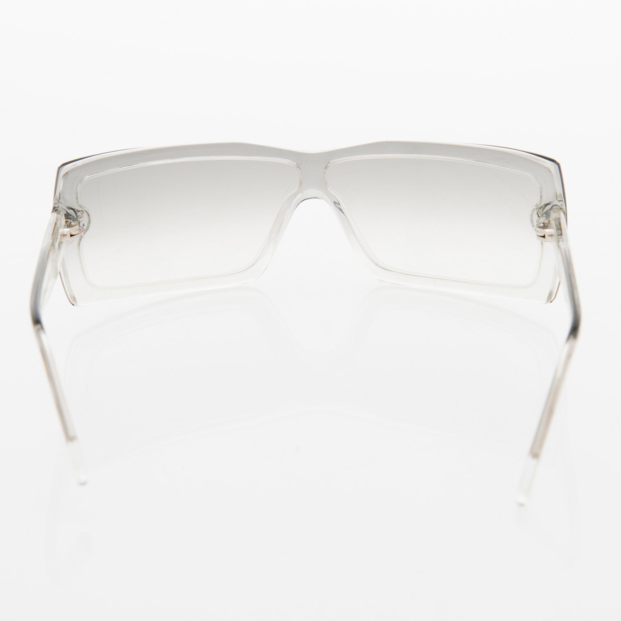 A Pair of Model 5067 Sunglasses.