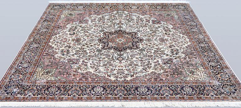 A Kashmir silk rug, approx. 215 x 212 cm.
