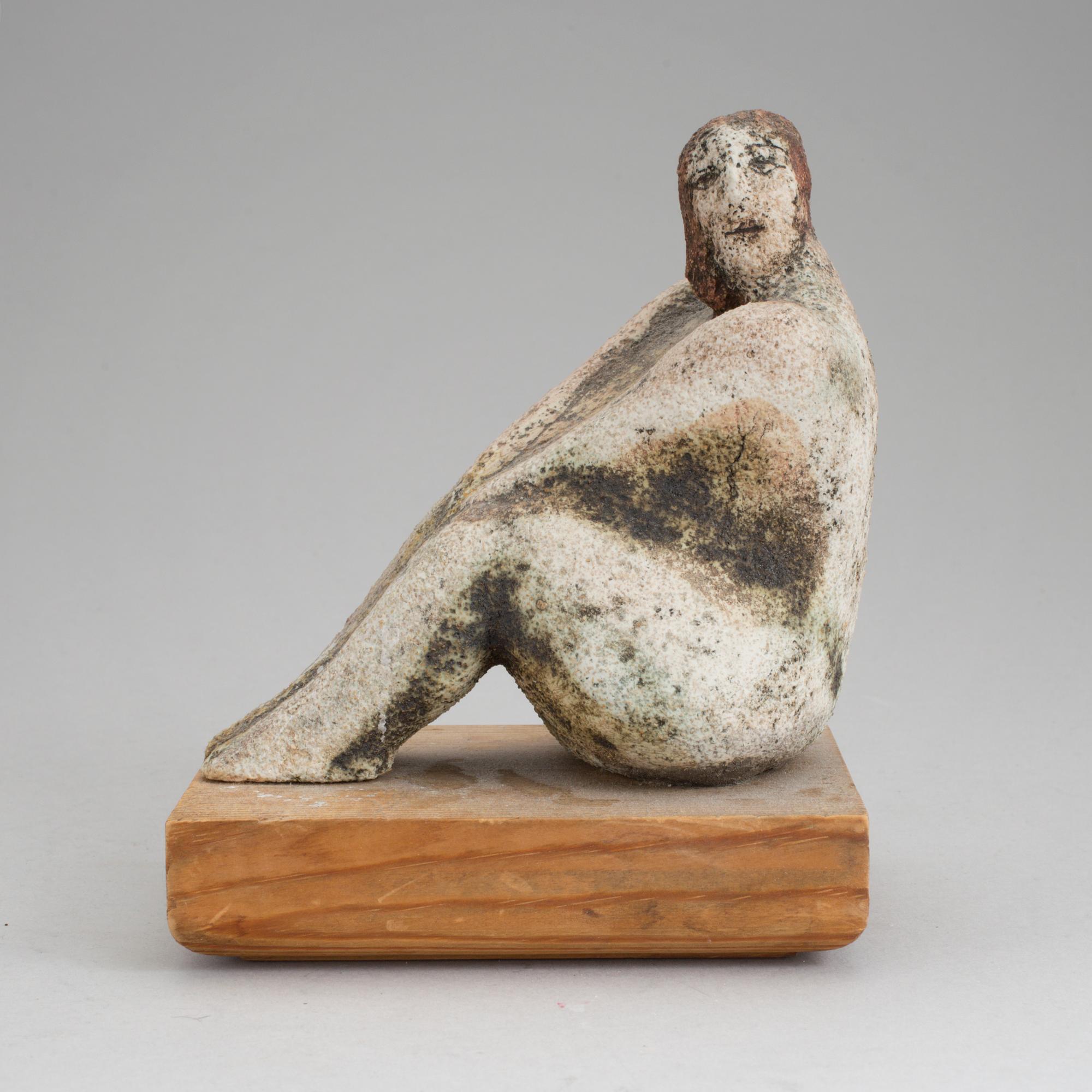 A stoneware sculpture designed by Lisa Larson for Gustavsberg, dated -95.