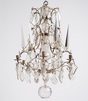 A Swedish rococo gilt-brass and cut glass six-branch chandelier by O. Westerberg (master in Stockholm 1769-1811).