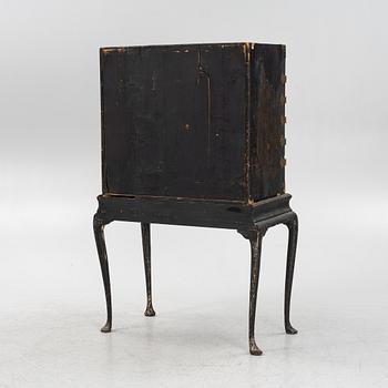 A Cabinet, on a stand, 19th century.