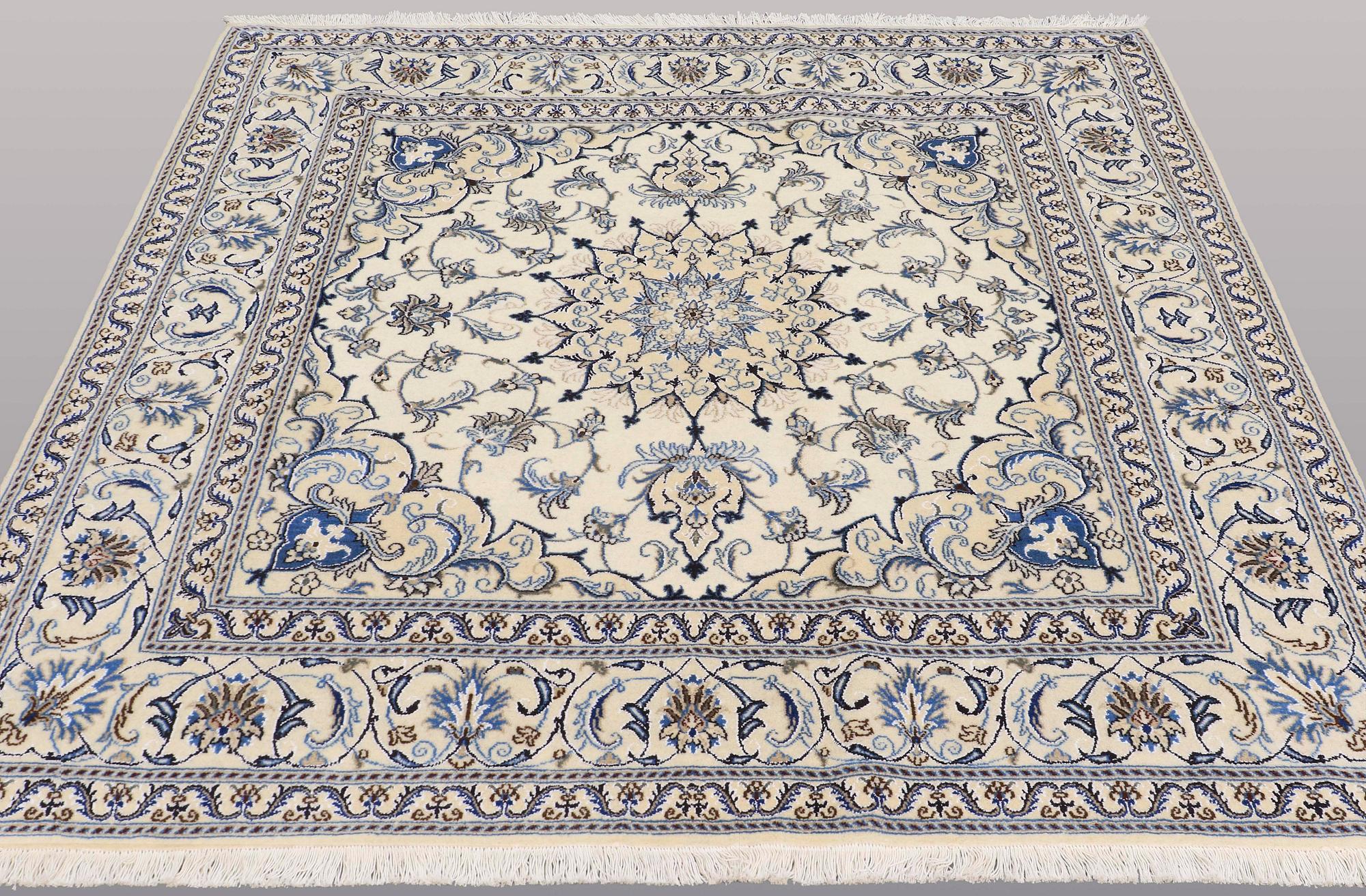 A rug, Nain part silk, ca 197 x 197 cm.