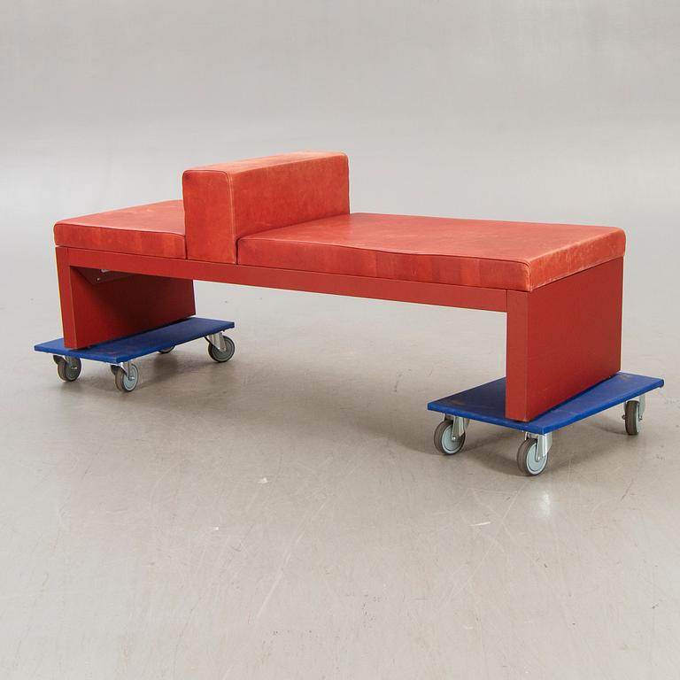 An Italian leather bench later part of the 20th century.