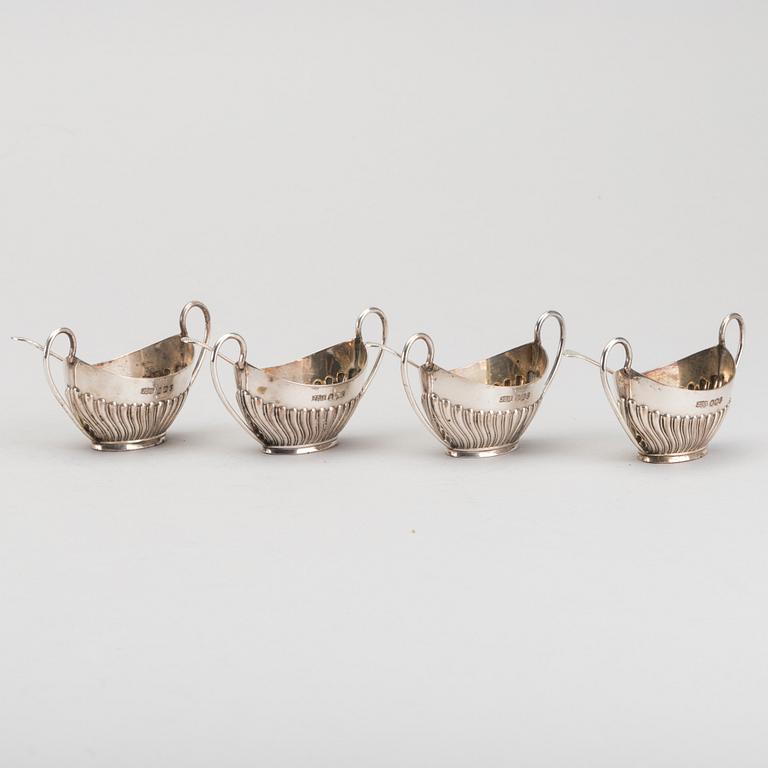An English set of four silver salters with spoons mark of James Dixon & sons Sheffield 1895, weight 166 gr.