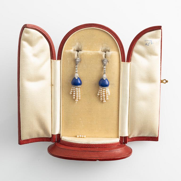 Earrings, with lapis lazuli, old-cut diamonds, and tassels with pearls.